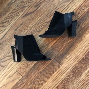 Black sling back mules